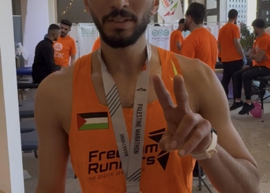 أسير محرر ينتزع وصافة ماراثون فلسطين الدولي بعد 32 شهرا بالأسر